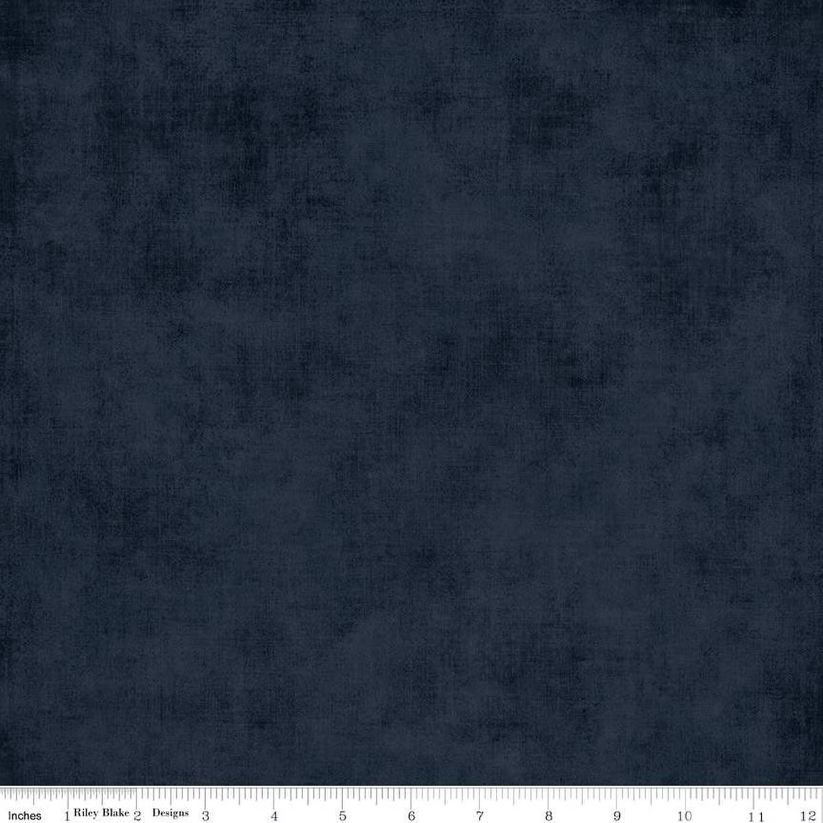 Navy blue fabric texture with a ruler at the bottom for scale.
