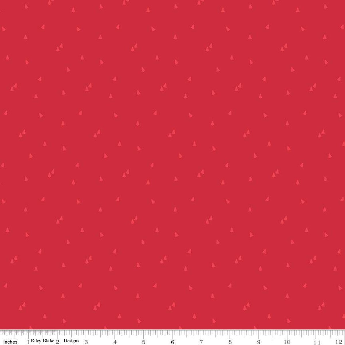 Red fabric with small lighter red pine tree scattered about