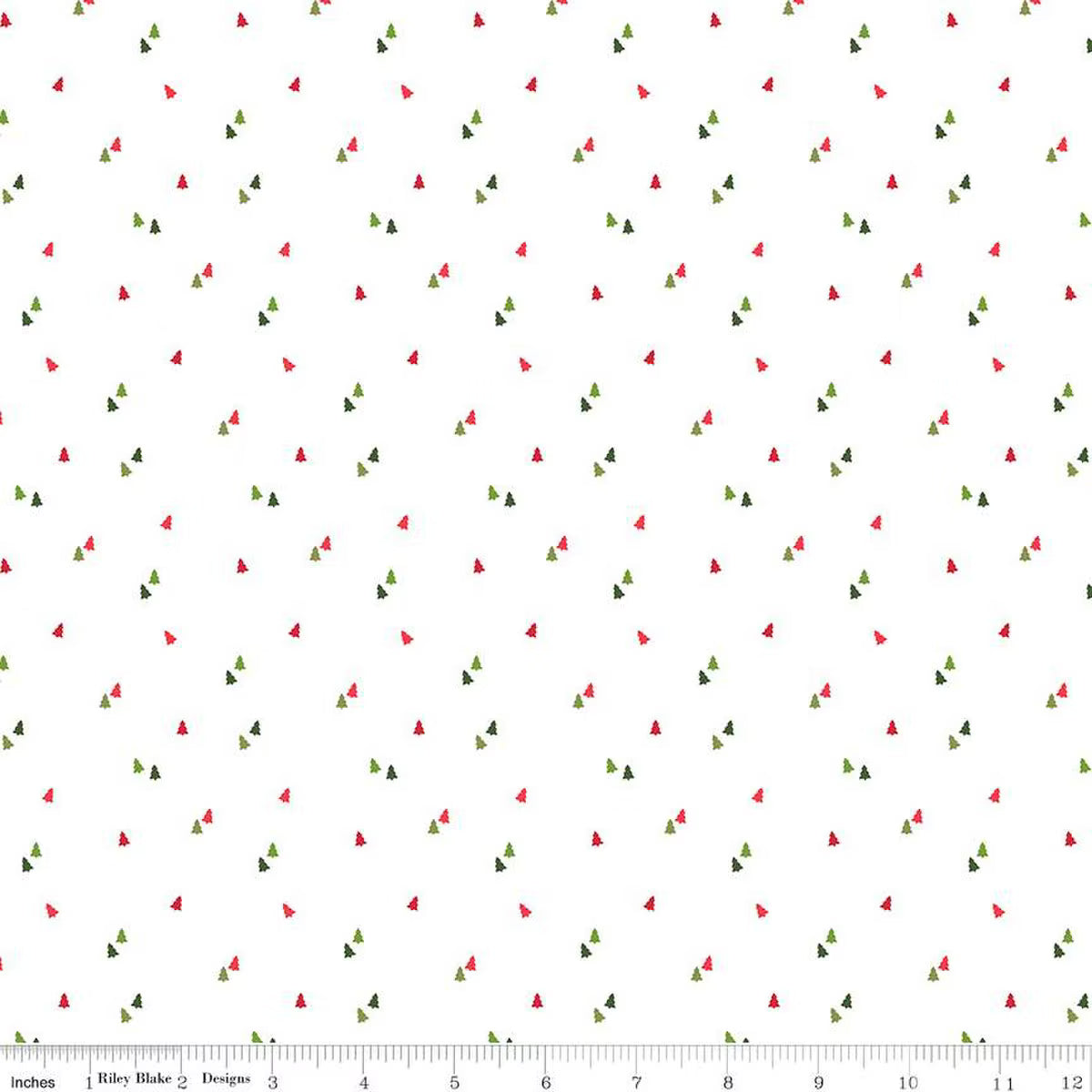 White fabric with a repeating pattern of small red and green pine trees, with a 12-inch ruler along the bottom edge.