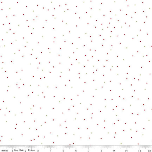 White fabric with green and red dots scattered
