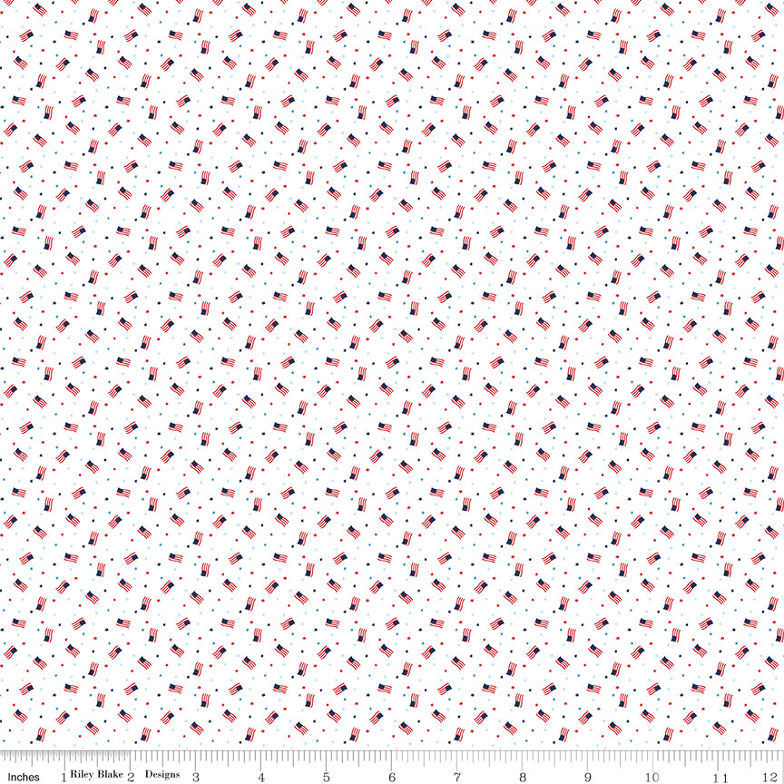 Pattern of small American flags on a white background with a ruler at the bottom.