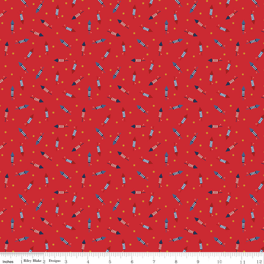 Pattern of colorful firecrackers on a red background with a ruler at the bottom.