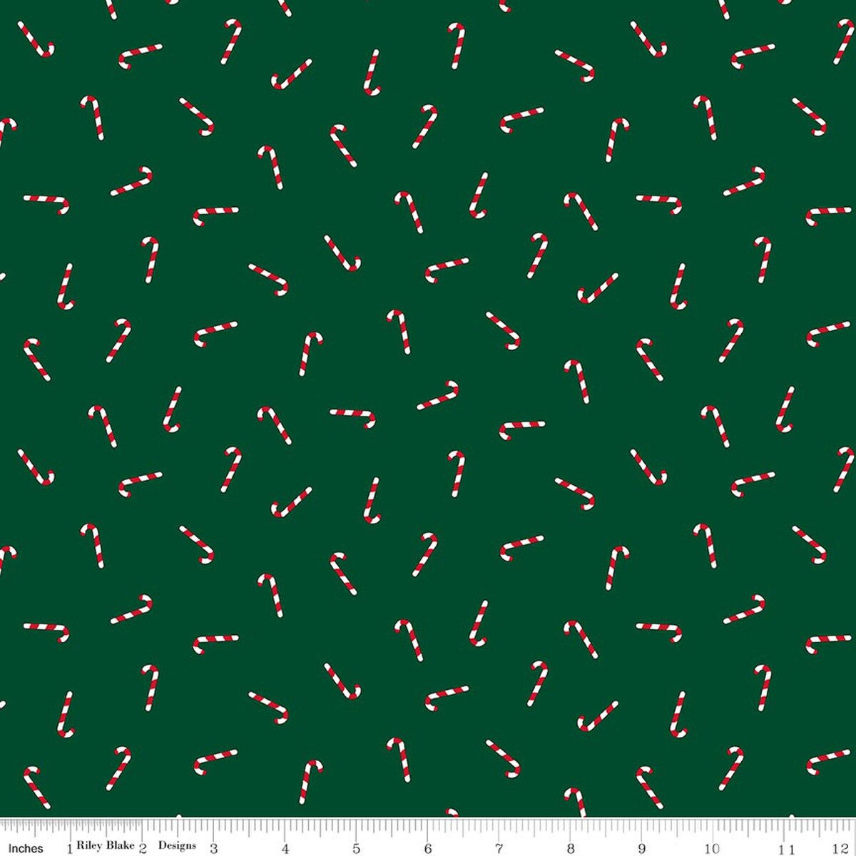Pattern of candy canes on a green background with a ruler at the bottom.