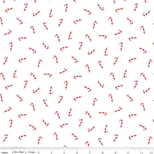 White fabric with candy canes scattered