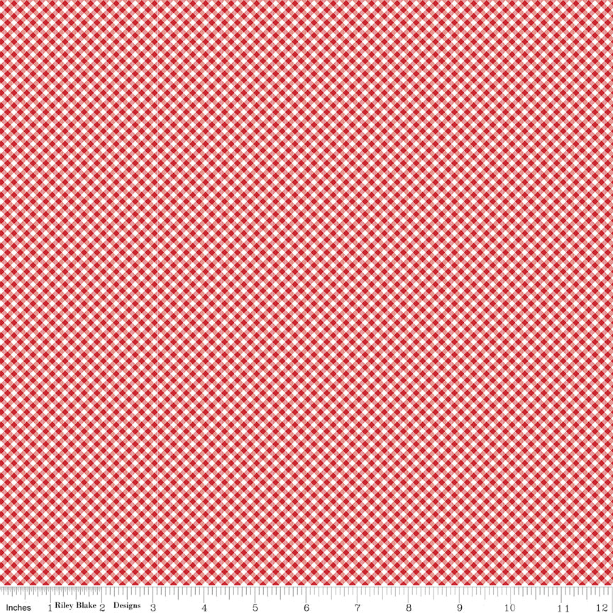 Red and white checkered fabric pattern with a ruler at the bottom.