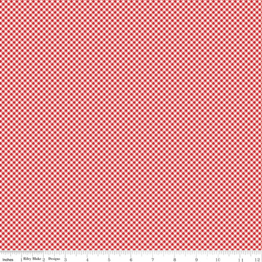 Red and white checkered fabric pattern with a ruler at the bottom.