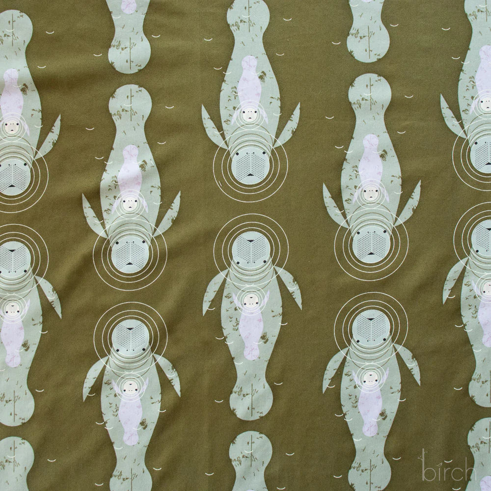 Pattern of stylized animals on a brown background with 'birch' branding.