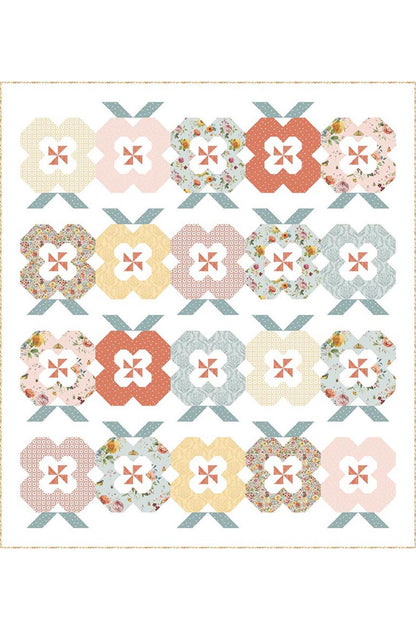Quilt with floral pattern on a white background