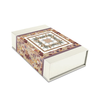 A rectangular presentation box with a quilted pattern on the lid and side, photographed on a clean white background.