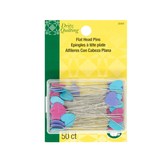 Pack of Dritz Quilting flat head pins with colorful heads on a yellow and green package.
