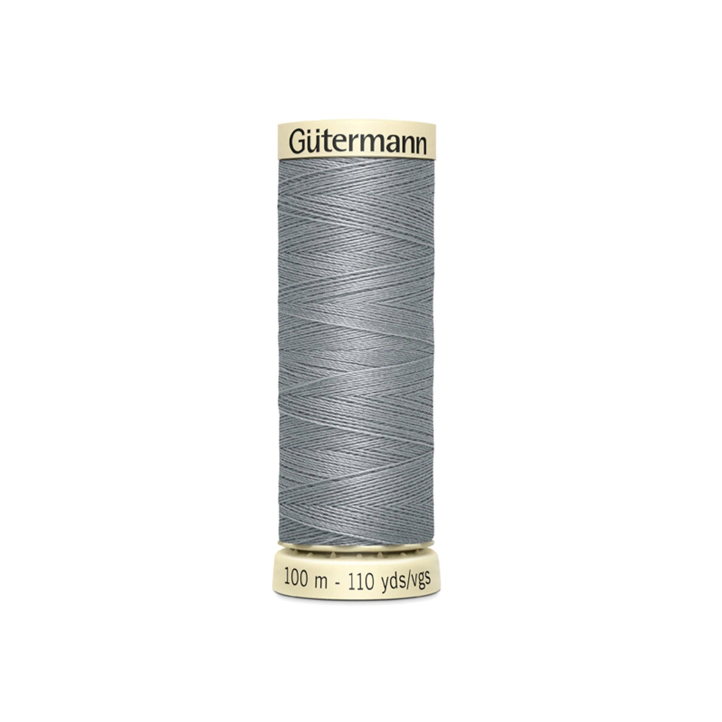Spool of Gutermann thread on a white background