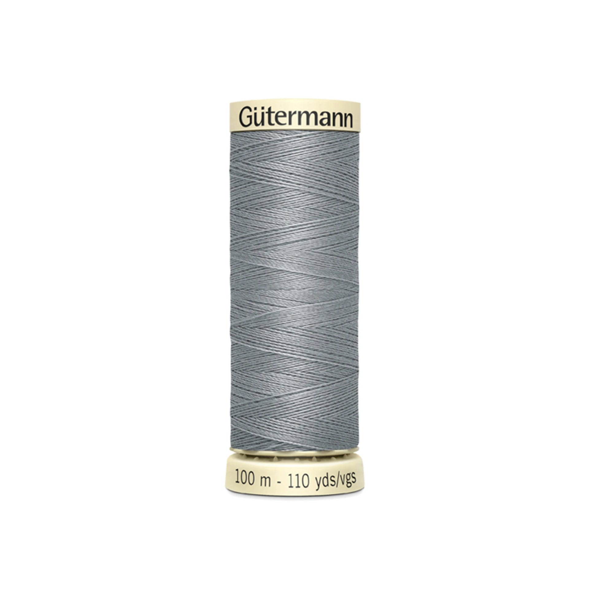 Spool of Gutermann thread on a white background