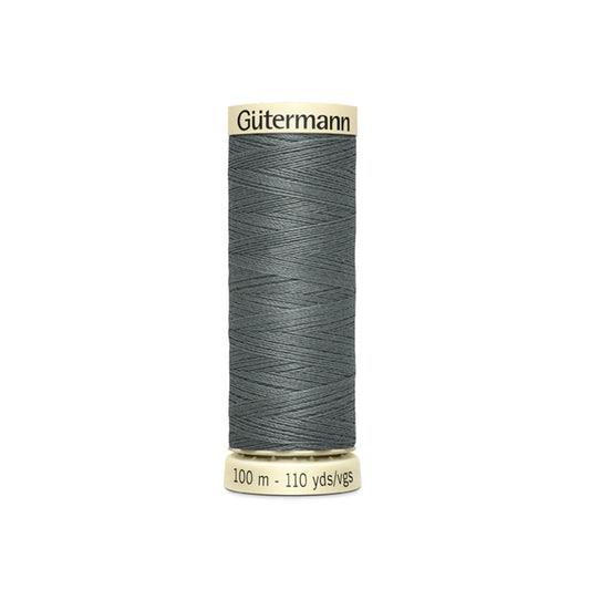 Spool of Gutermann thread on a white background
