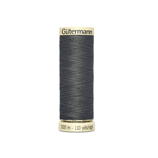 Spool of Gutermann thread on a white background