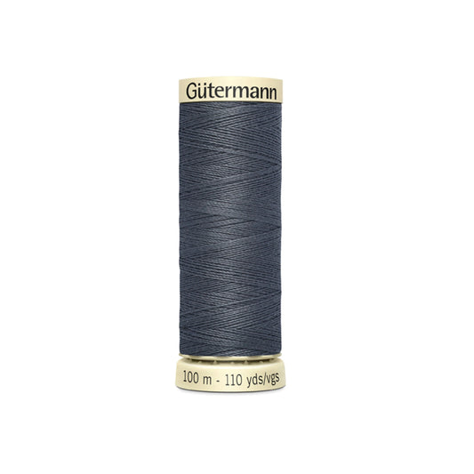 Spool of Gutermann thread on a white background