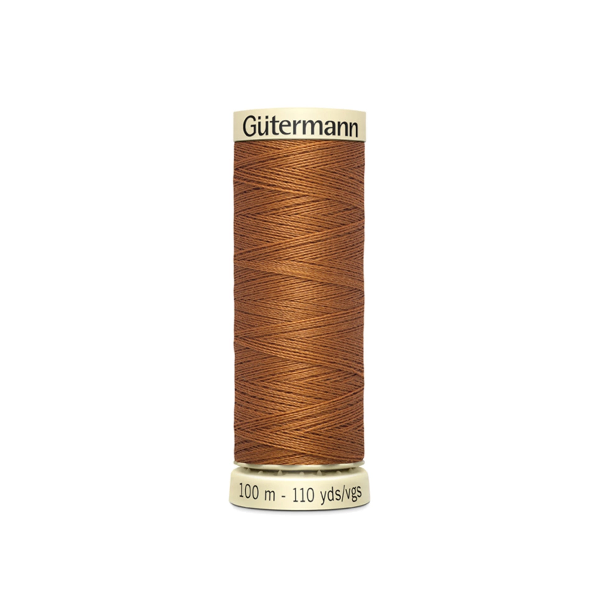 Spool of Gutermann thread on a white background