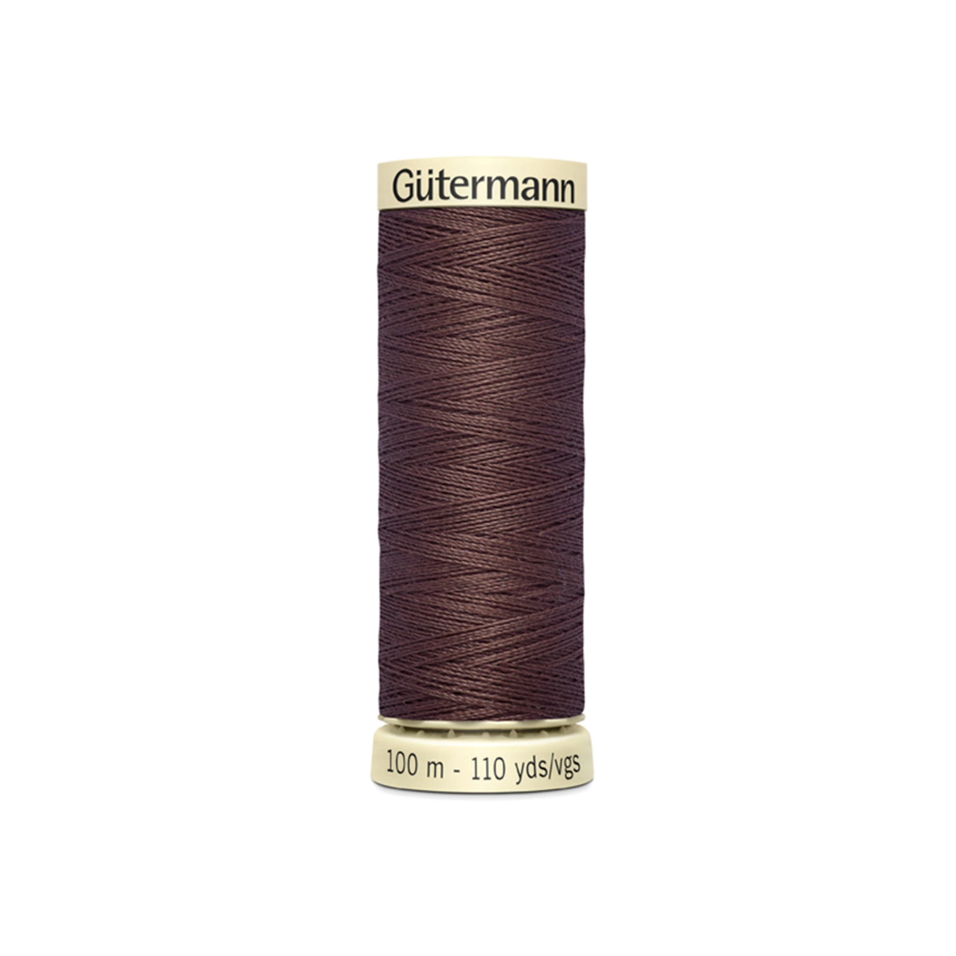 Spool of Gutermann thread on a white background