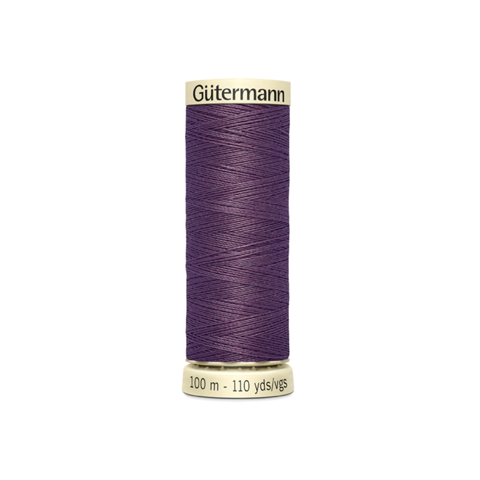 Purple spool of Gutermann thread on a white background