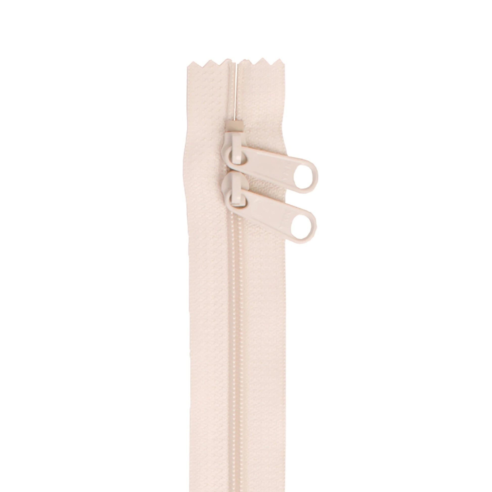 Beige zipper on a white background