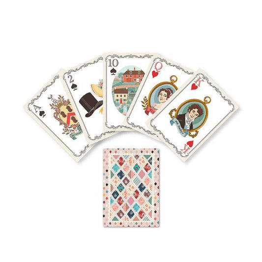 Set of playing cards with decorative designs on a white background
