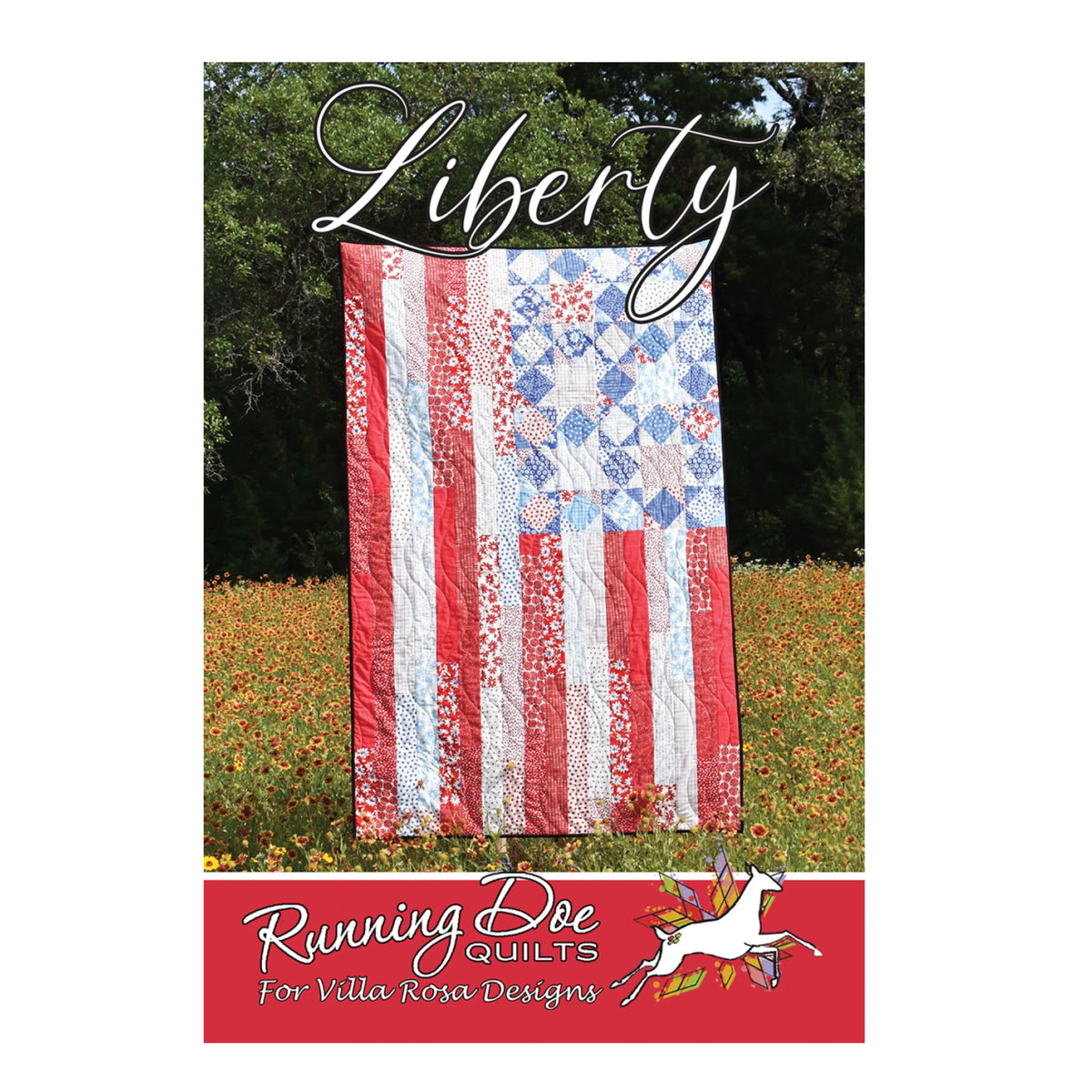 A quilted American flag design with red, white, and blue patterned fabric hanging outdoors in a field, with the word 'Liberty' across the top and a red banner at the bottom reading 'Running Bee Quilts for Vella Rose Designs.'.