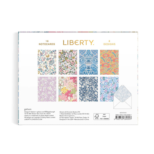 Liberty Notecards 8 Designs notepad pack, featuring a white cover with gold text and a grid of eight colorful floral and damask pattern swatches.