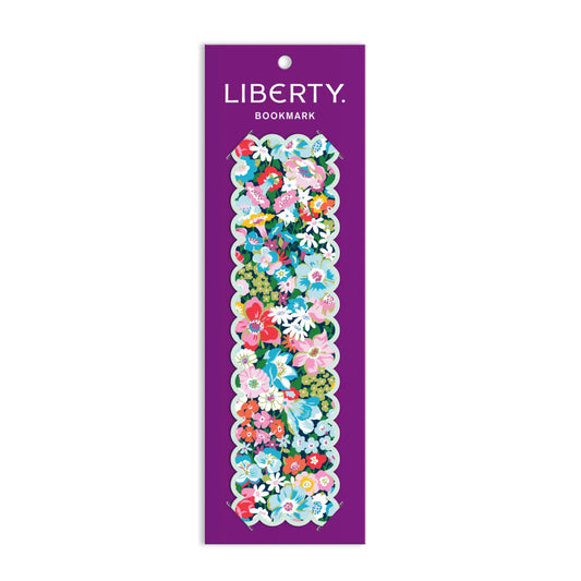 Liberty Bookmark on a purple card, featuring a colorful array of flowers and leaves.