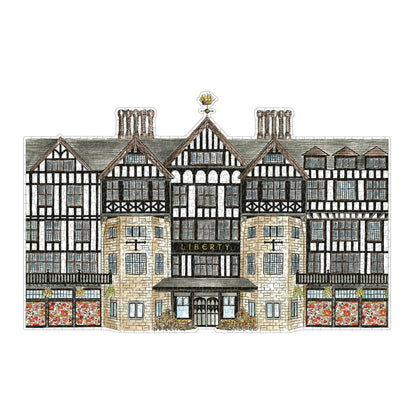 A square architectural illustration of a historic timber-framed building with stone lower sections, multiple chimneys, decorative windows, and a central sign reading LIBERTY, shown on a plain white background.