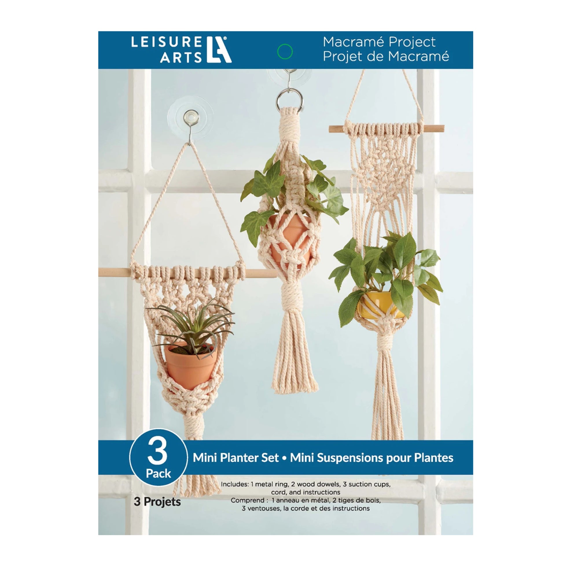 Leisure Arts macramé mini planter set packaging with plants and hooks.