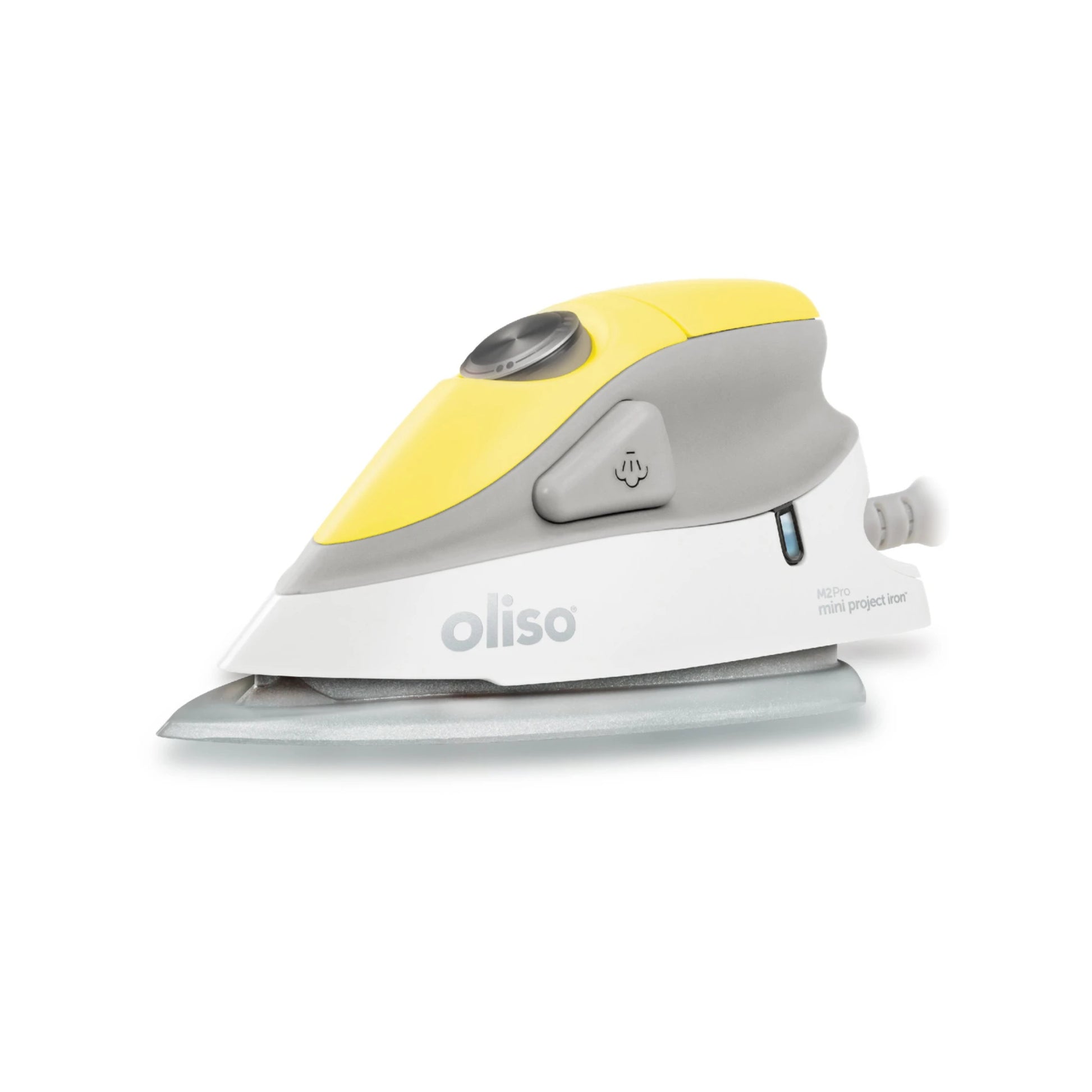 White and yellow Oliso iron on a white background