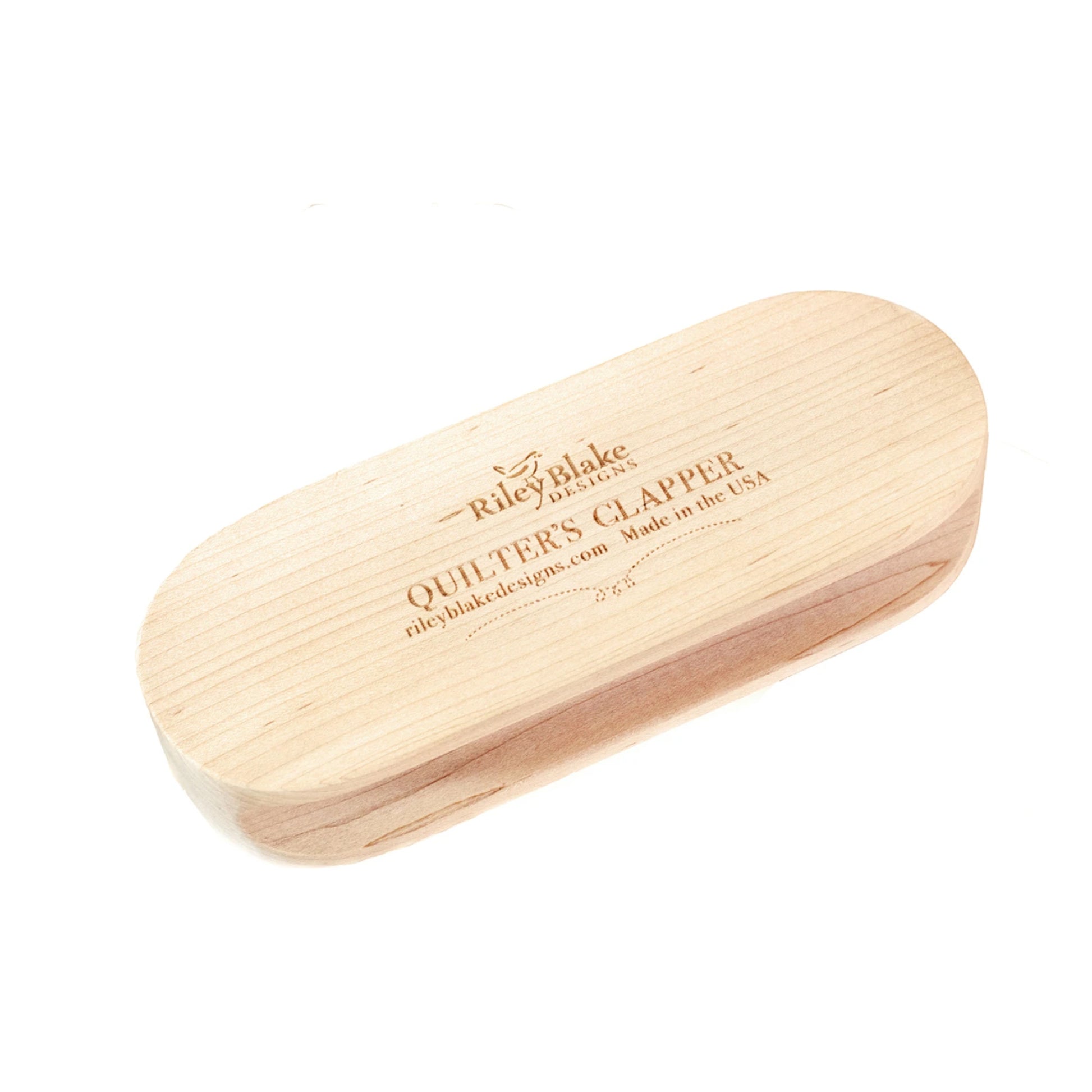 Wooden clapper with 'Riley Blake Designs' branding on a white background