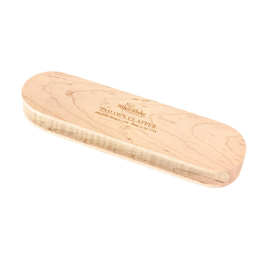 Wooden shoe tree on a white background