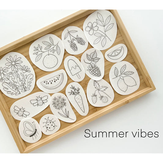 Variety of Summer Themed embroidery templates on a tray