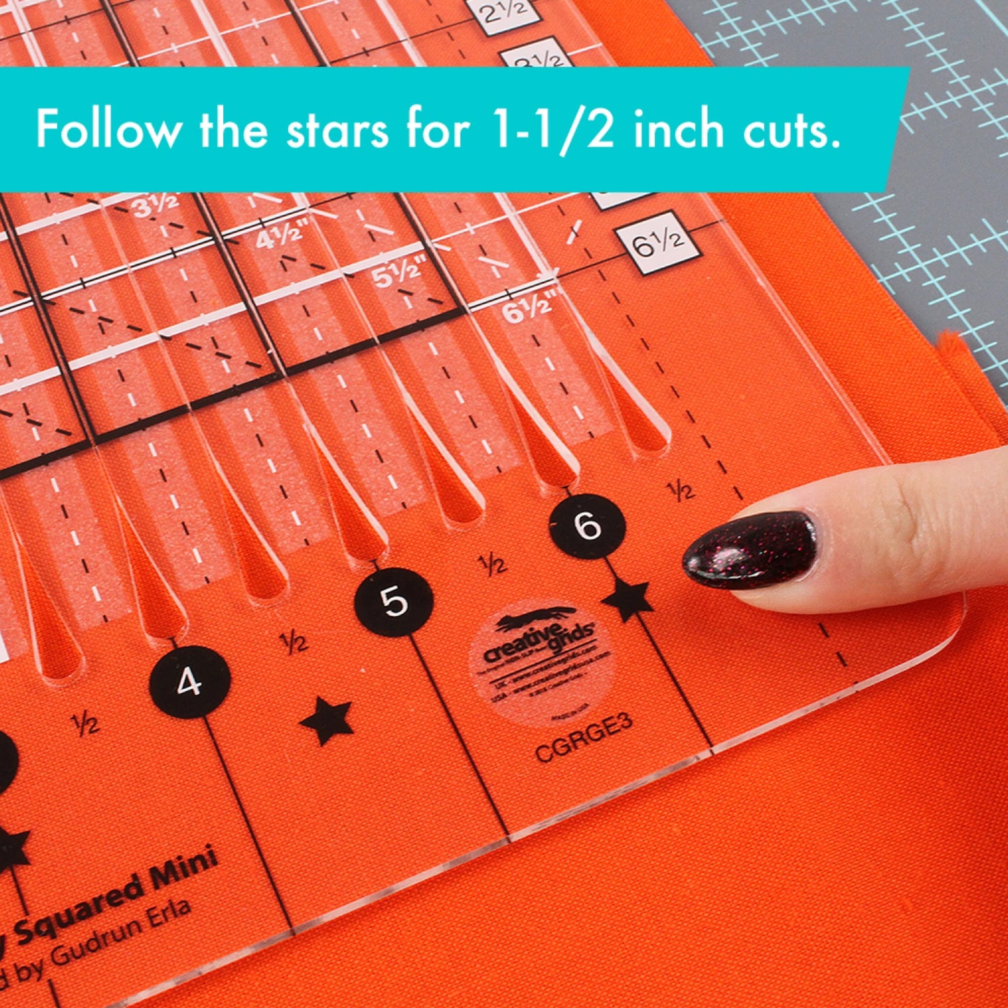 Stripology Quilt Mini Ruler with measurement markings on a cutting mat