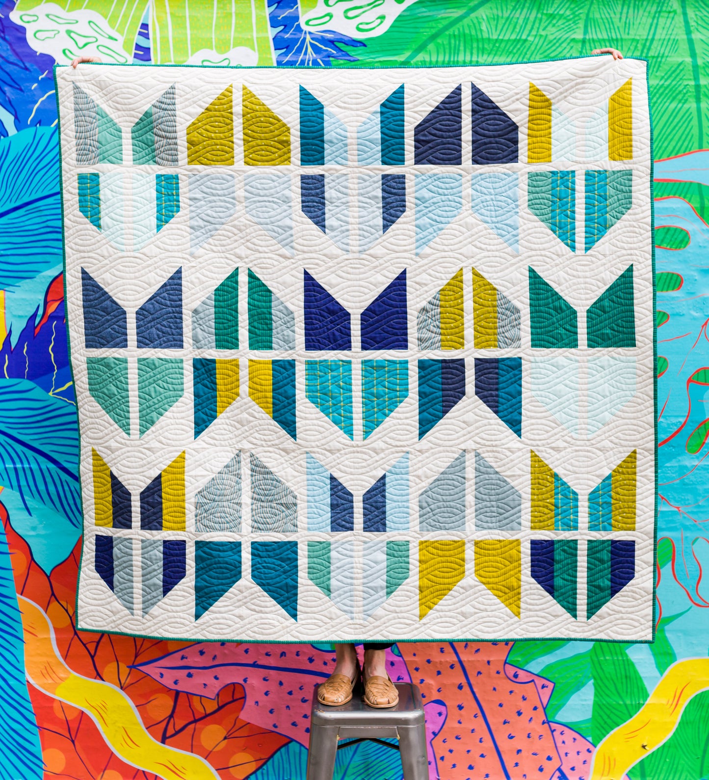 Tail Feather Quilt with Colorful background
