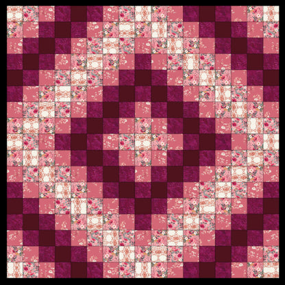 Patchwork quilt with pink and purple squares