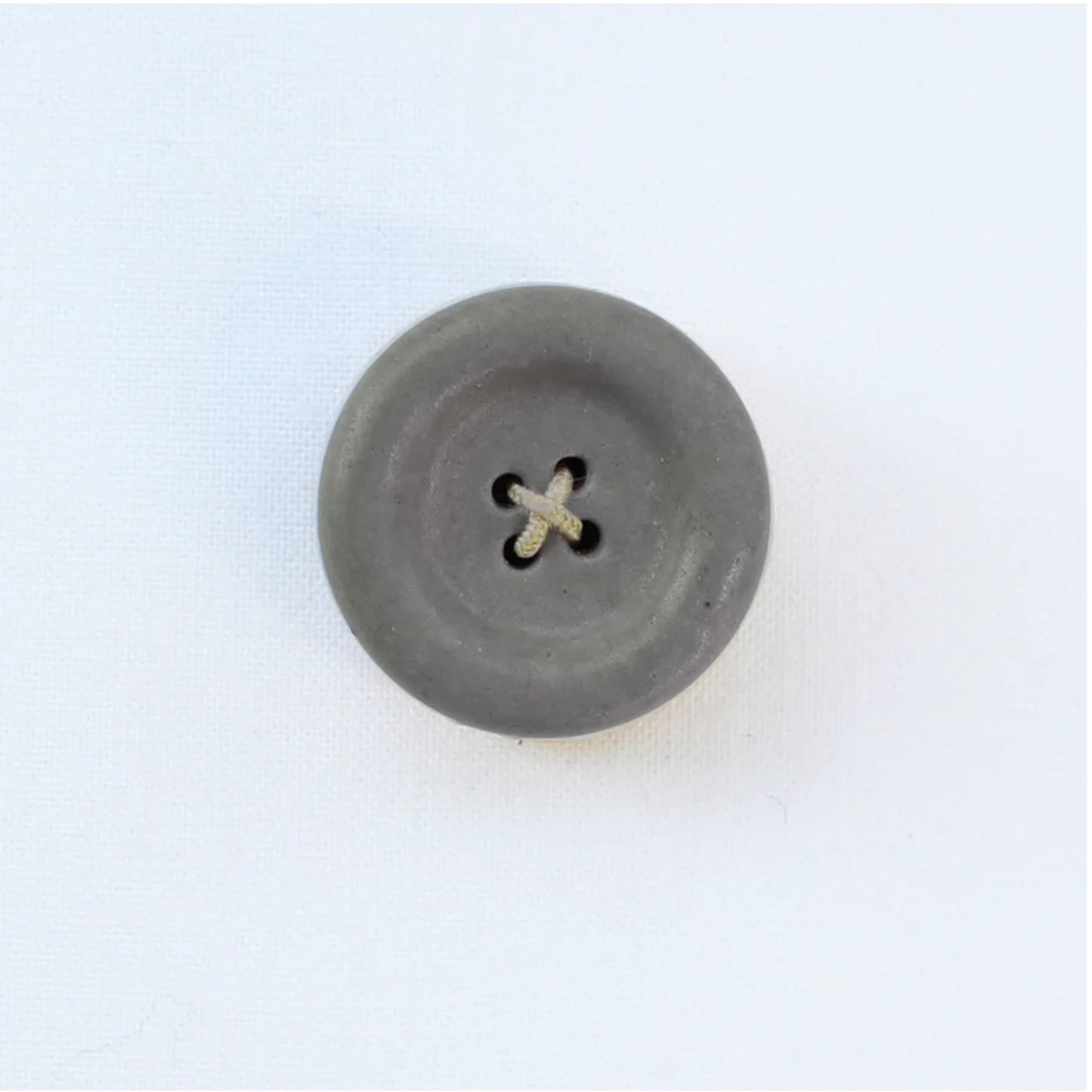 Gray button on a white background