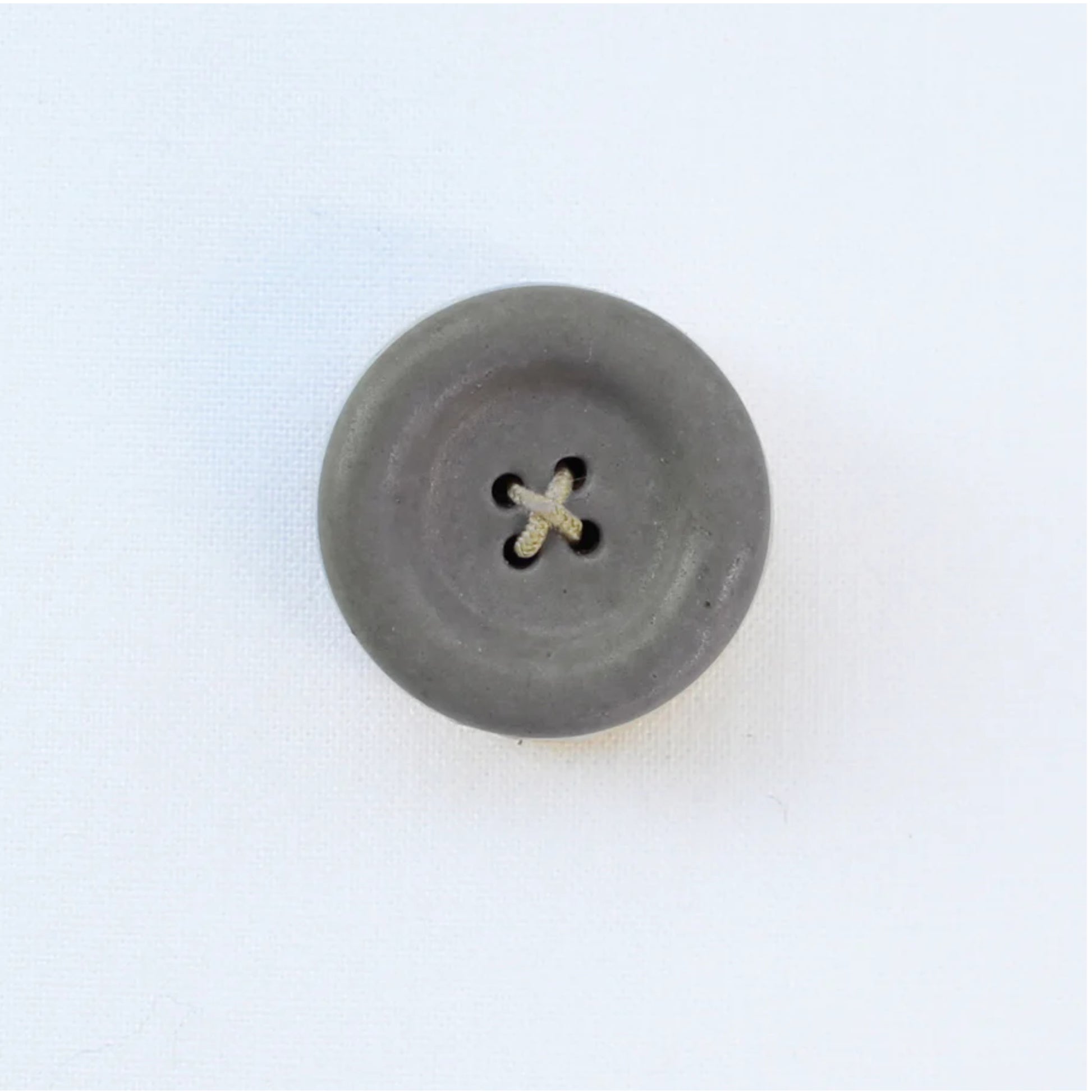 Gray button on a white background