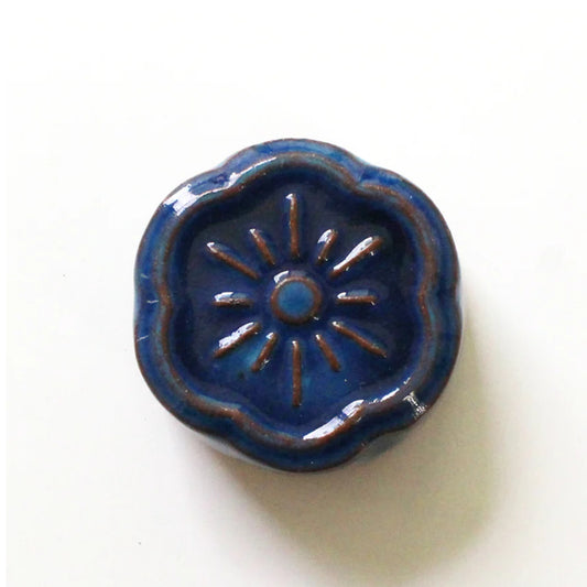 Ceramic Flower Needle Minder and Polisher from Cohana