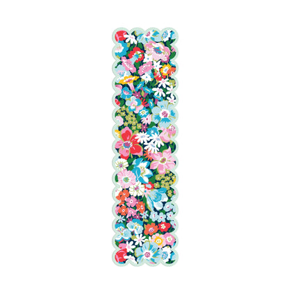 A long, narrow rectangular bookmark covered in a dense multicolor floral print, shown on a plain white background.