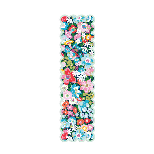 A long, narrow rectangular bookmark covered in a dense multicolor floral print, shown on a plain white background.