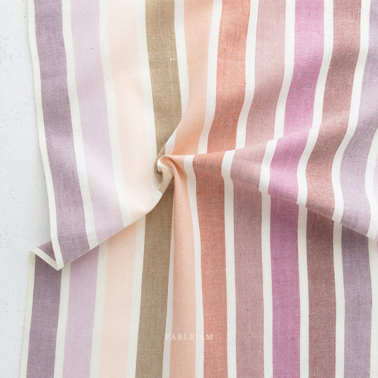 Striped fabric with pastel colors on a white background