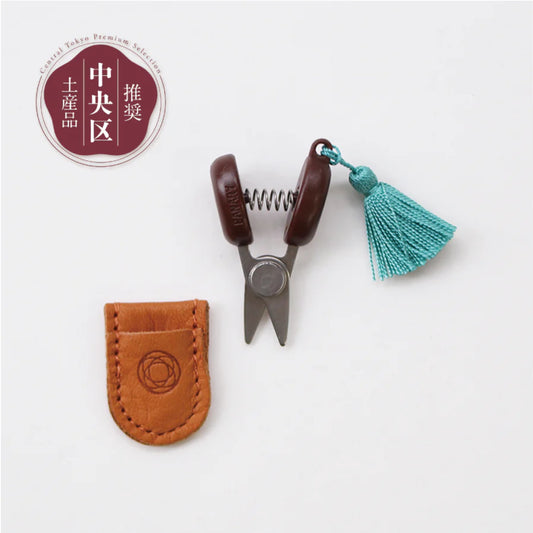 Mini Scissors with teal tassel and leather sheath