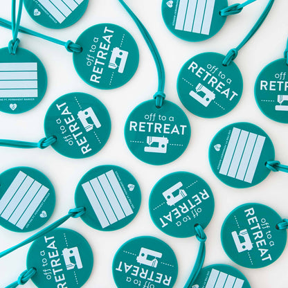 Multiple teal tags with 'off to a retreat' text and graphics on a white background