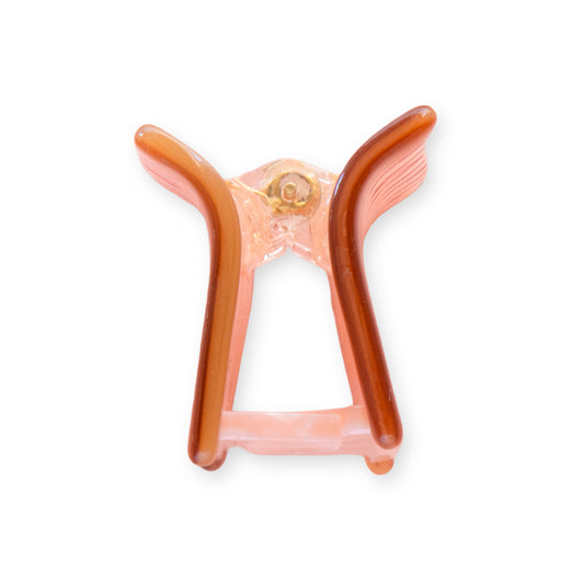 Sideview of Thread Spool Hair Claw