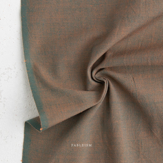 Green and Orange fabric on a white background, featuring the brand 'Fableism'.