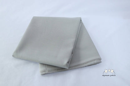 Kona Cotton Solids Ash fabric folded