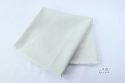 Kona Cotton Solids Haze fabric folded