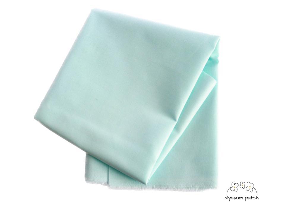 Kona Cotton Solids Sea Glass fabric folded