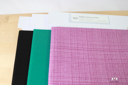 Wildberry Woven precut fabric paired with Kona Solids Emerald and Kona Solids Black